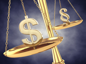 Dollar and paragraph sign on a brass scale , 3d illustration